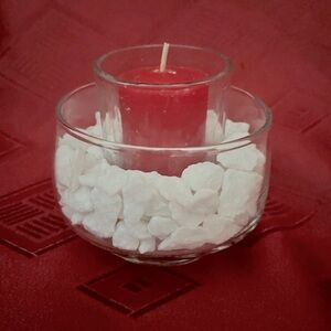 Glass votive candle holder with marble chip base and choice of candle color